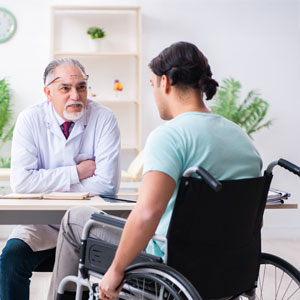 Personal Injury Claim: Doctor with Patient in Wheelchair